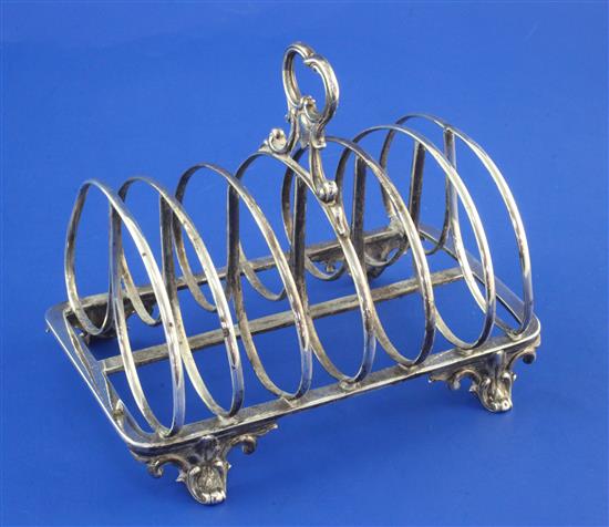 A Victorian silver seven bar toast rack, by The Barnards, 9 oz.